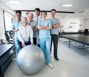 team of therapists in physical therapy office