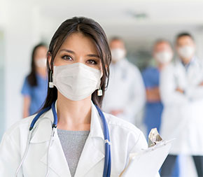 woman health worker in mask