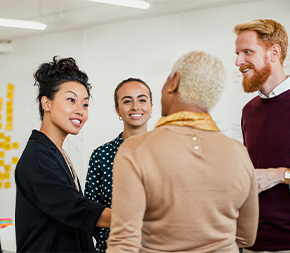 professionals greeting each other at meeting