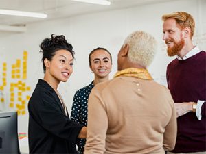 professionals greeting each other at meeting