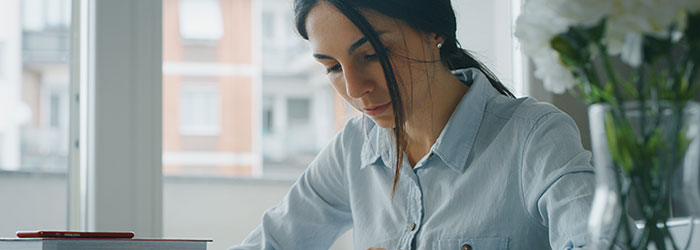 woman deciding upon what degree to earn