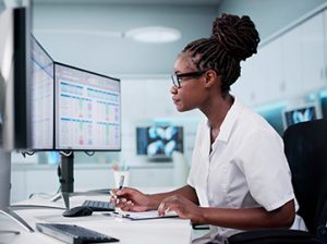 medical biller and coder works at coding medical procedures online