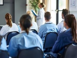 medical billers sitting in training class for continuing education